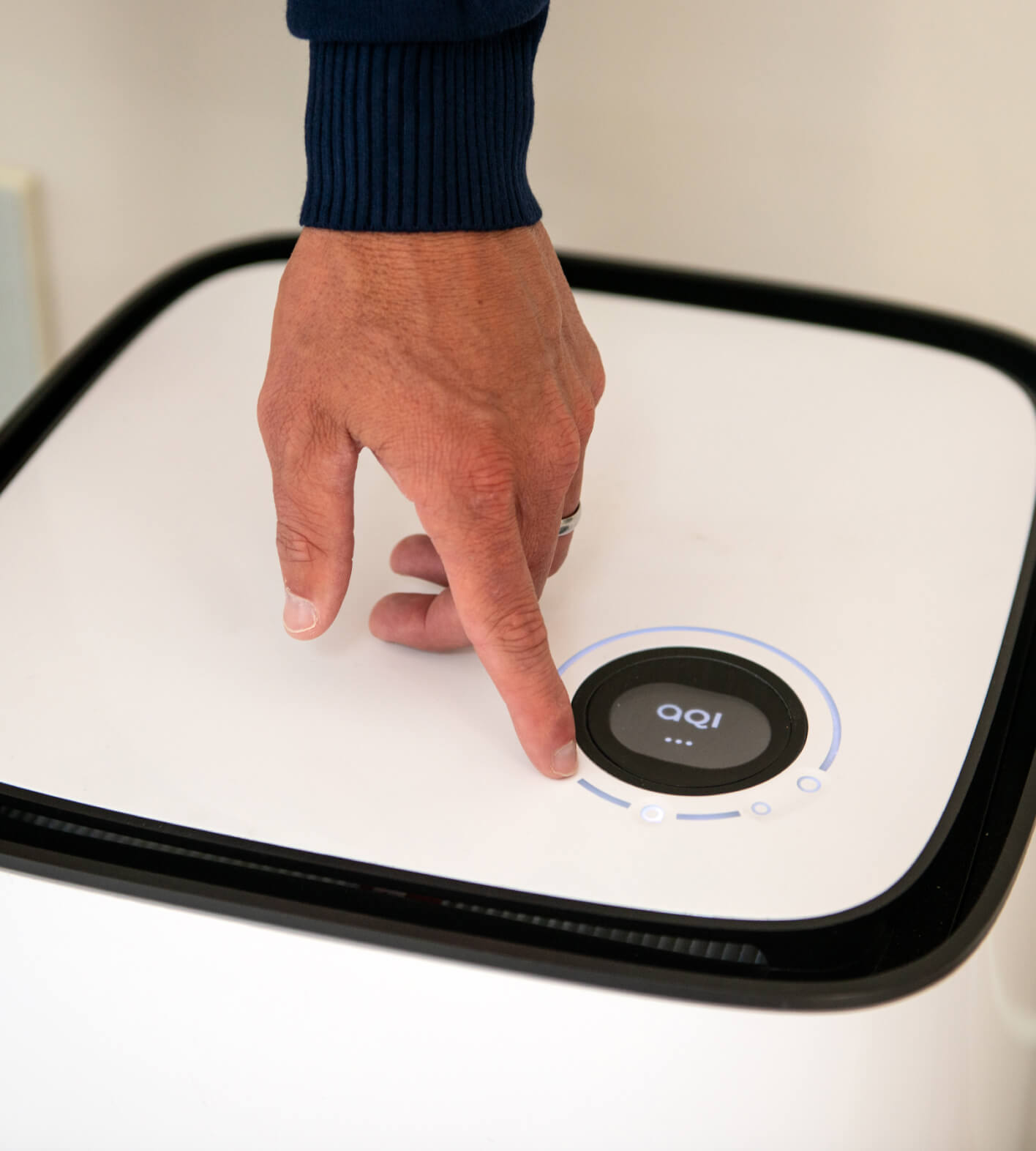Hand touching aair 3 in 1 Pro